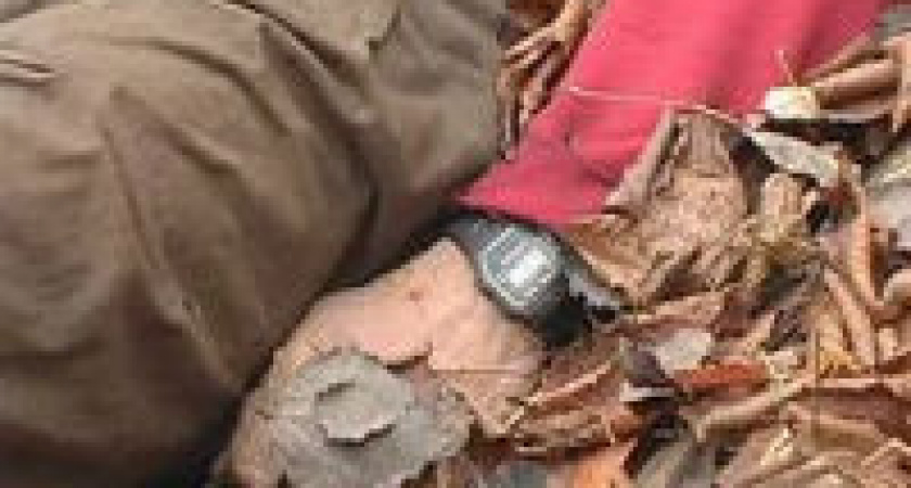 На севере Волгограда в куче сгоревшего мусора обнаружен труп мужчины